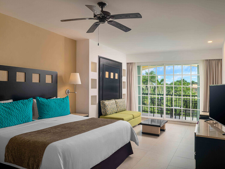 Junior suite con una cama