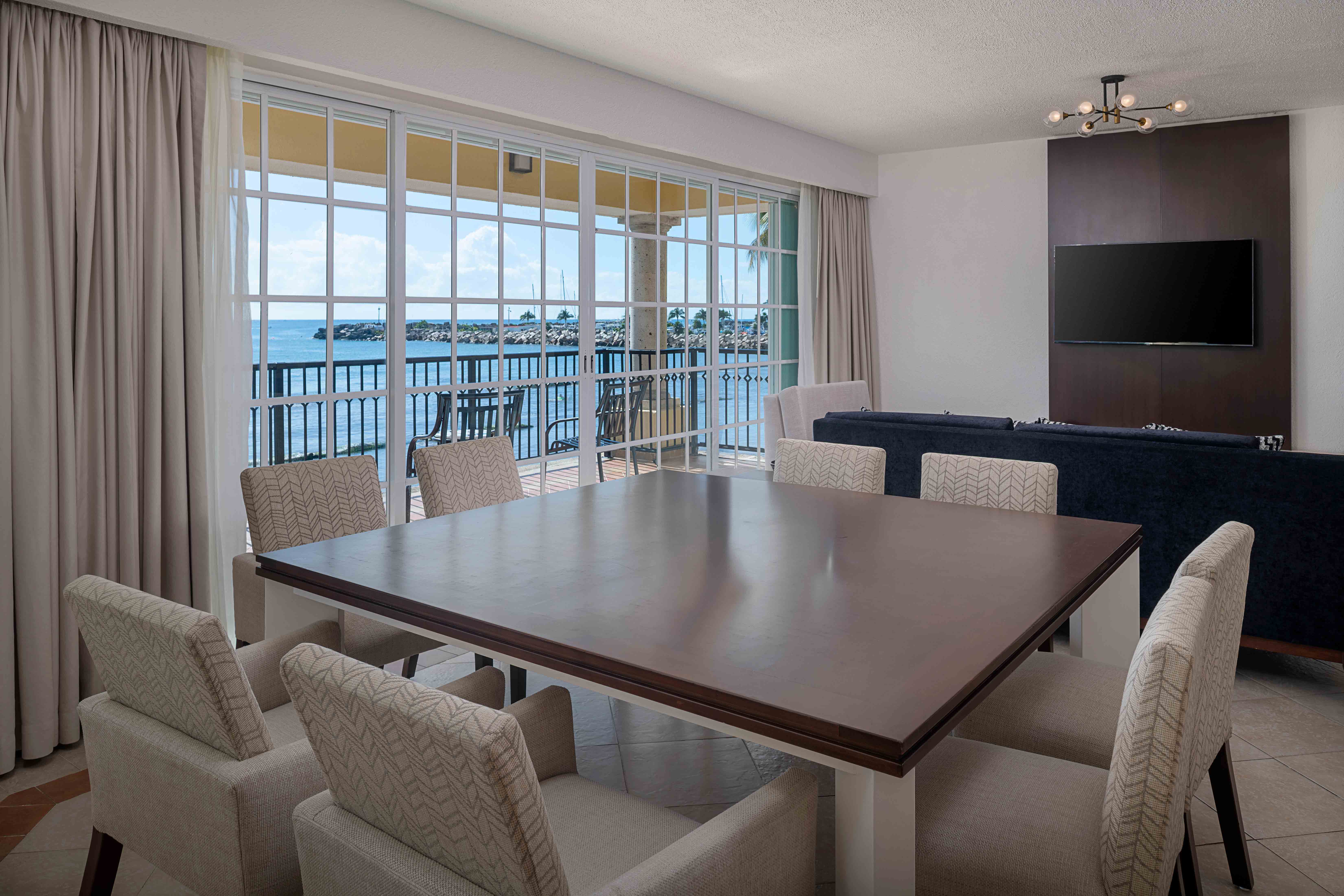 Living room space with a seating and dining area