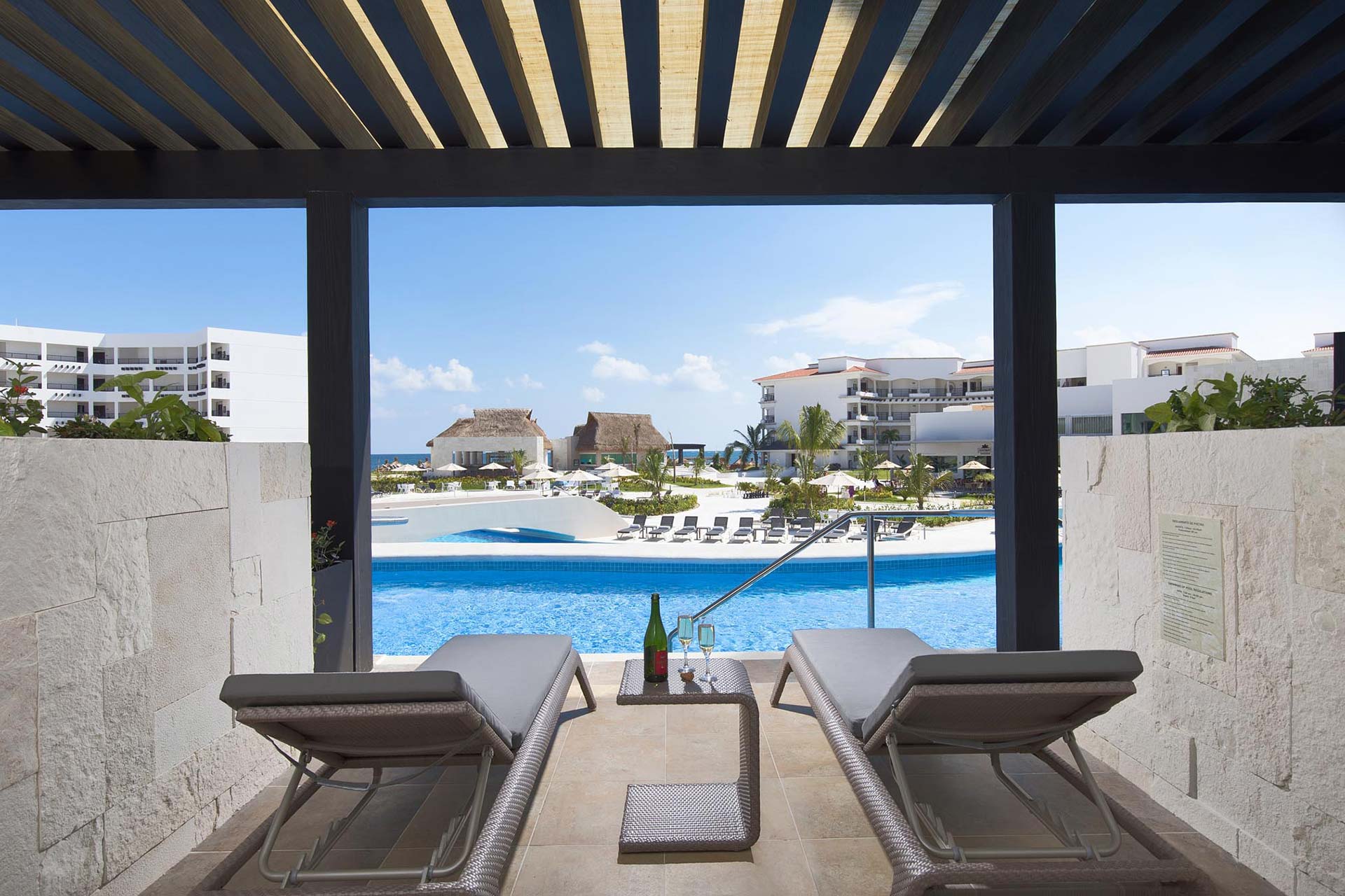 Private terrace with a pool view